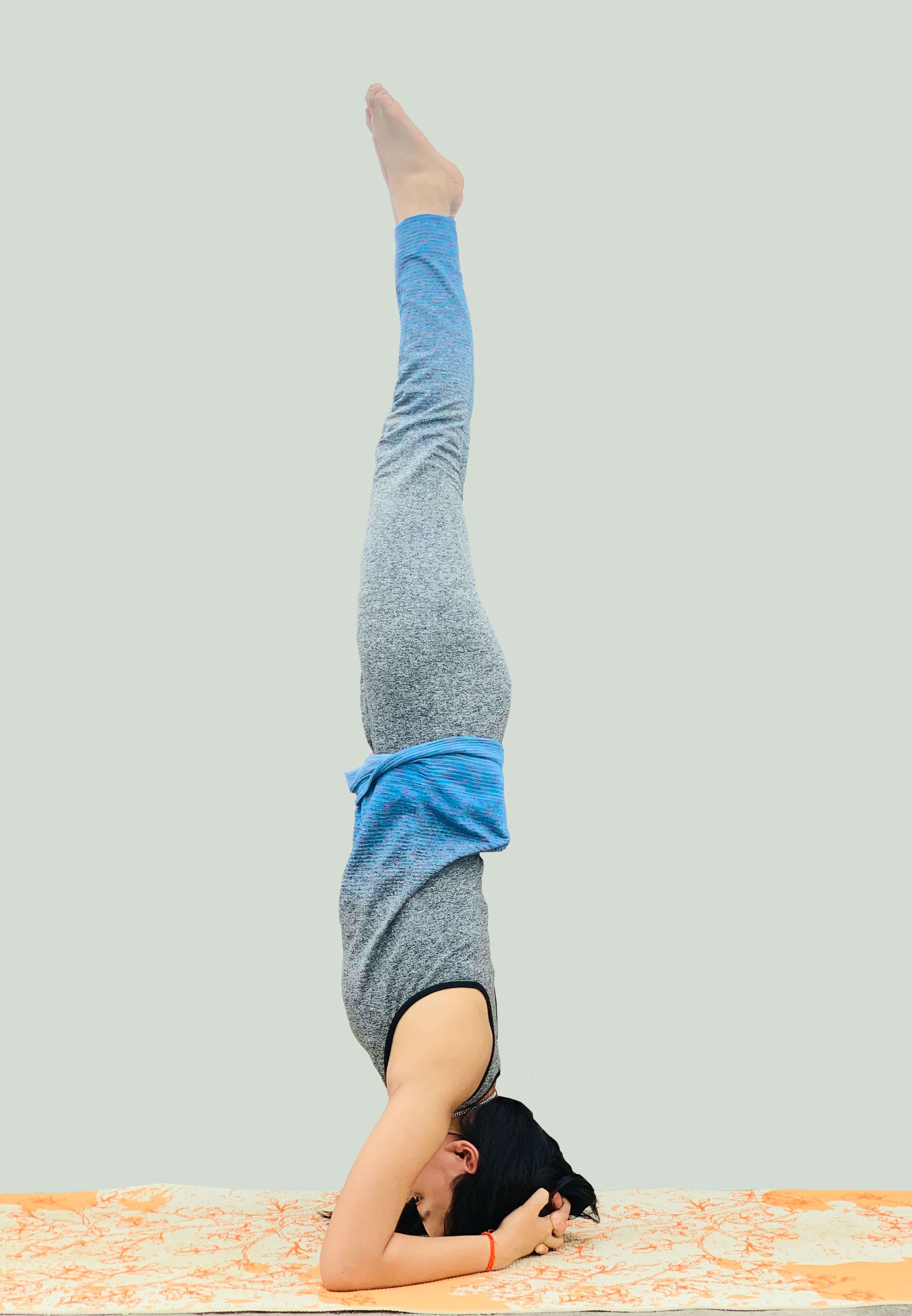 How to Do the Headstand Pose in Yoga Without Kicking Your Way Up | SELF