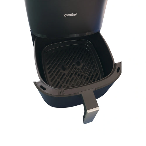Close-up of the 5.5L XL non-stick air fryer basket, perfect for family-sized portions and easy cleaning.