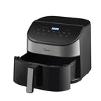 The large 6-liter non-stick basket of the Midea air fryer, perfectly sized for family meals and whole chickens.